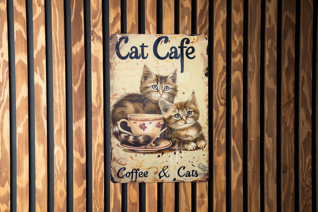 a picture of two kittens in a coffee cup