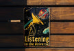 a metal sign that reads listening to the universe
