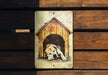 a picture of a dog in a dog house