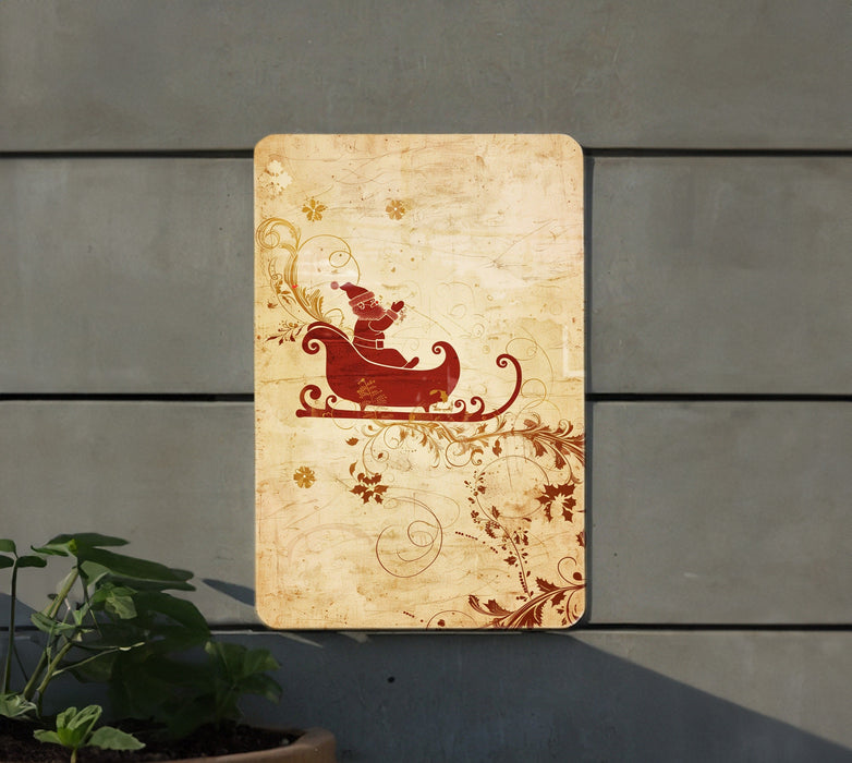 a wooden sign with a santa sleigh on it