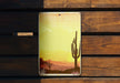 a picture of a desert scene on a phone case