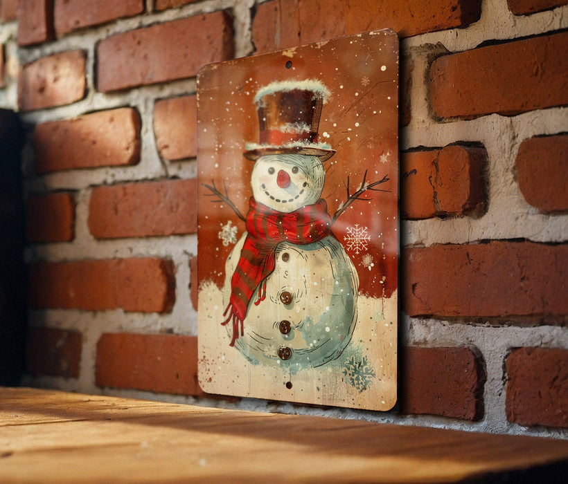 a picture of a snowman on a brick wall