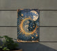 a picture of a sun and moon on a wall