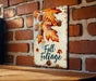a sign on a brick wall that says fall foliage