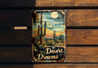 a tin sign that says desert dreams on it