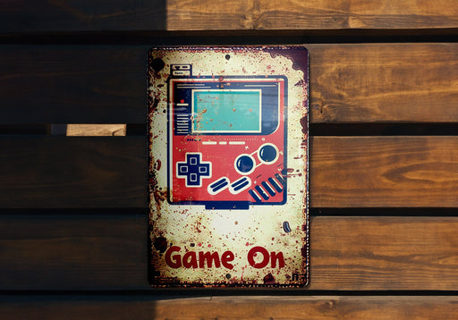 a game on sign on a wooden wall
