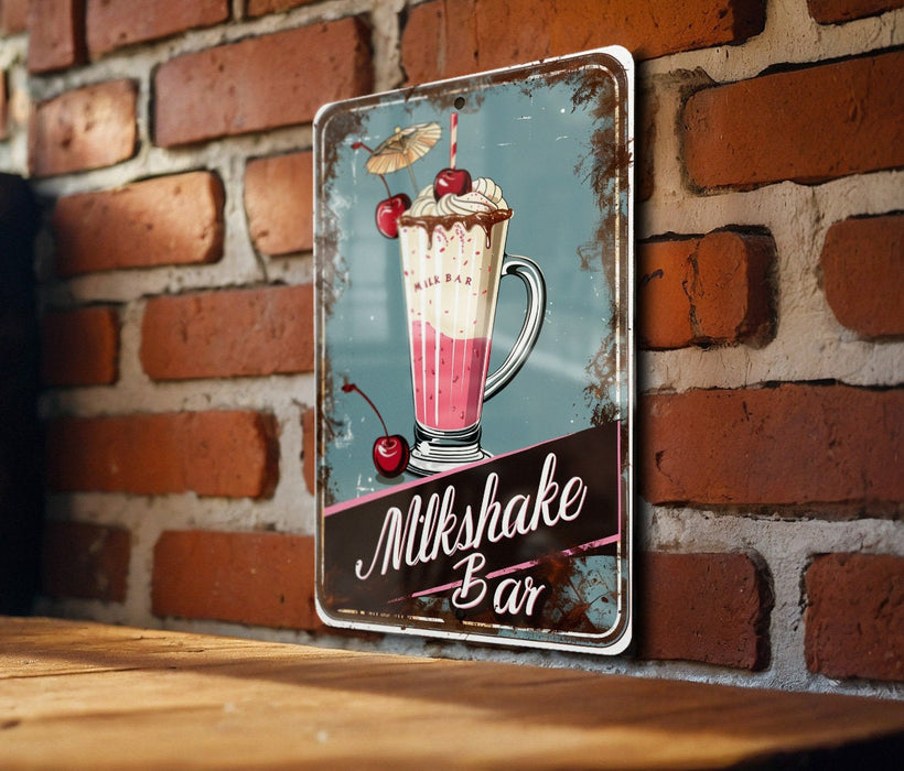 a sign on a brick wall that says milkshake bar