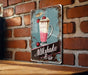 a sign on a brick wall that says milkshake bar
