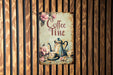 a sign on a wooden wall that says coffee time