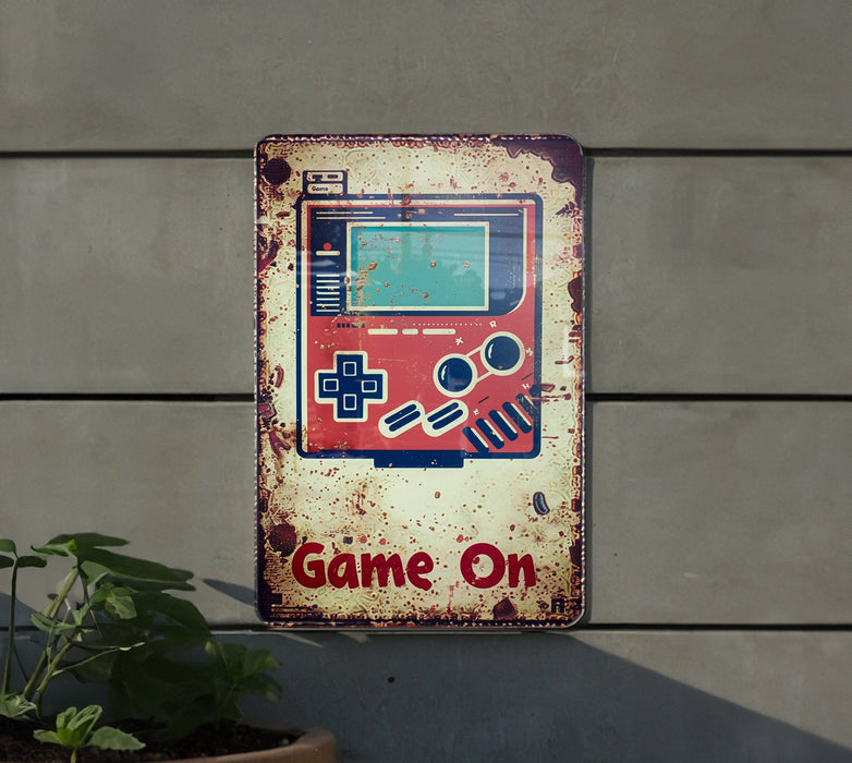a game on sign on the side of a building