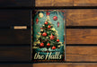 a metal sign with a christmas tree on it