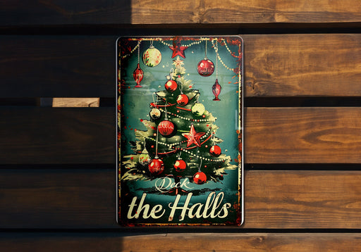 a metal sign with a christmas tree on it