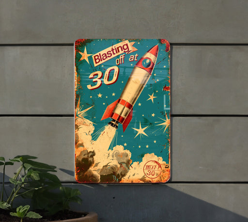 a metal sign with a rocket on it