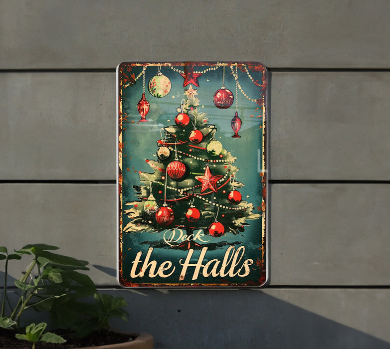 a metal sign with a christmas tree on it