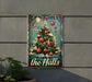 a metal sign with a christmas tree on it