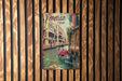 a wooden wall with a picture of a boat in the water