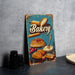a bakery sign sitting on top of a table