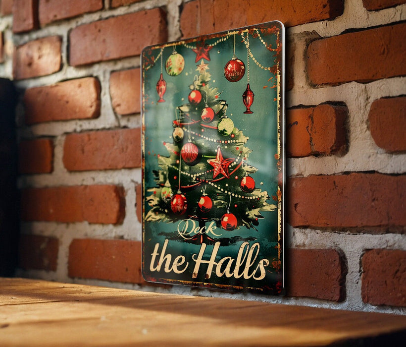 a picture of a christmas tree hanging on a brick wall