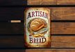 a sign that says artisan bread on it