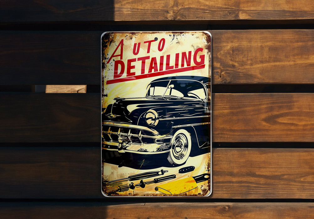 a metal sign that says auto detailing on it