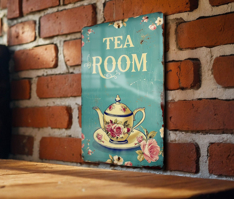 a tea room sign on a brick wall