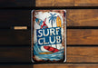 a rusted surf club sign hanging on a wooden wall