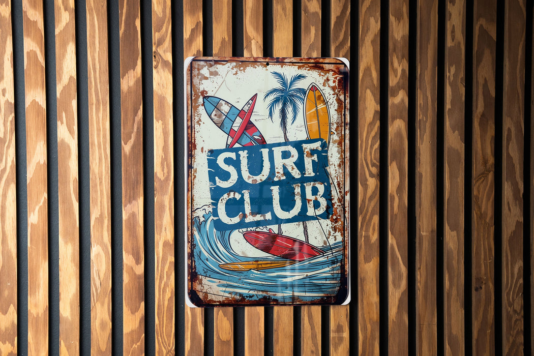 a surf club sign hanging on a wooden wall