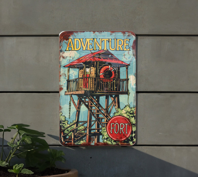 a sign on the side of a building that says adventure fort