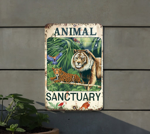 an animal sanctuary sign on the side of a building