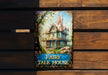 a picture of a fairy tale house on a wooden bench