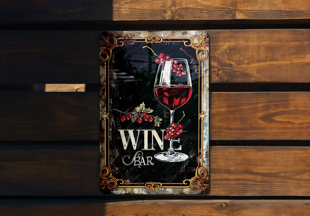 a metal sign with a glass of wine on it