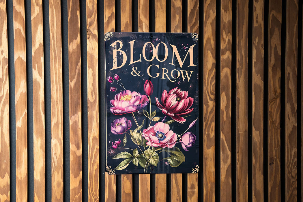 a sign on a wooden wall that says bloom and grow