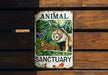 an animal sanctuary sign on a wooden wall