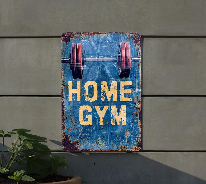 a sign that says home gym hanging on a wall