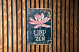 a sign on a wooden wall that says find your zen