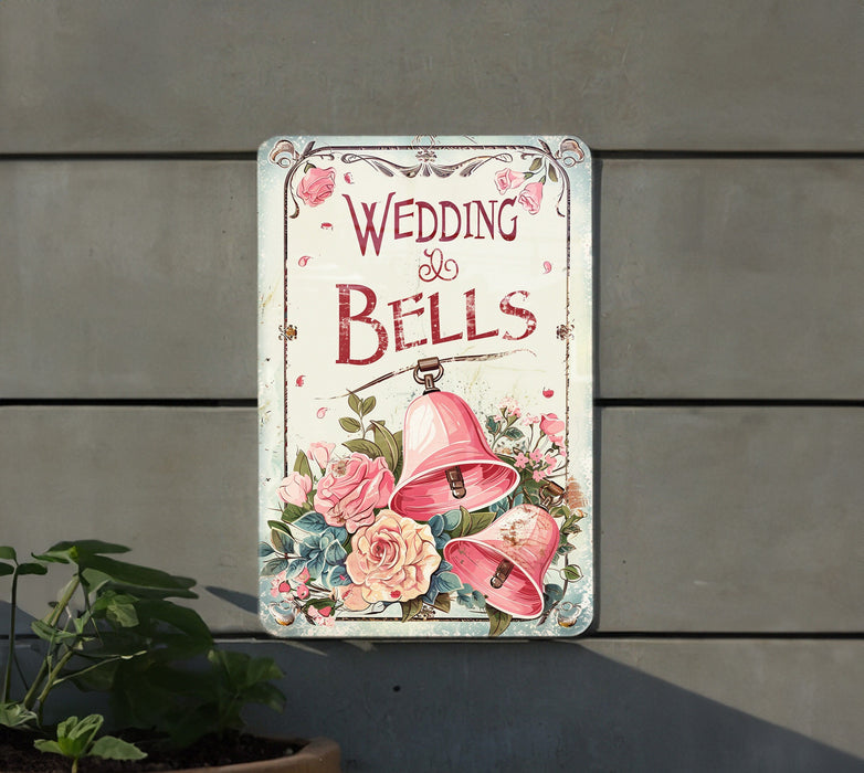 a sign on the side of a building that says wedding bells