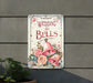 a sign on the side of a building that says wedding bells