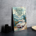 a road trip sign sitting on top of a table