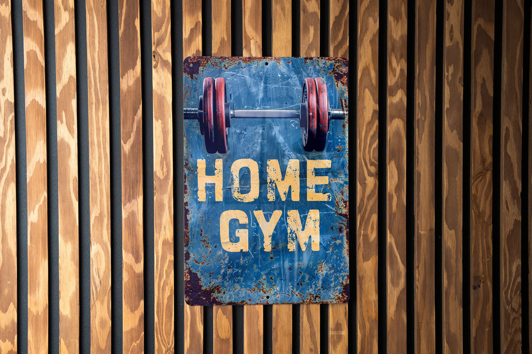 a blue sign that says home gym hanging on a wooden wall