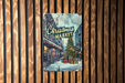 a christmas market sign hanging on a wooden wall