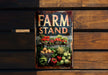 a sign that says farm stand on a wooden wall