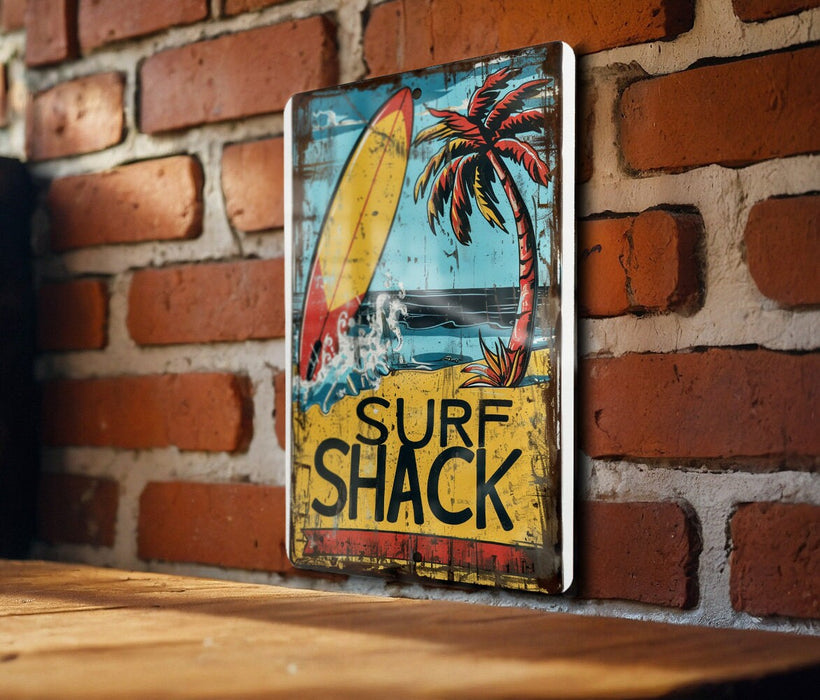 a surf shack sign on a brick wall