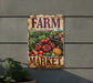 a sign on a wall that says farm market