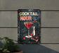 a metal sign that says cocktail hour on it
