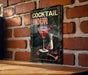 a sign on a brick wall that says cocktail hour