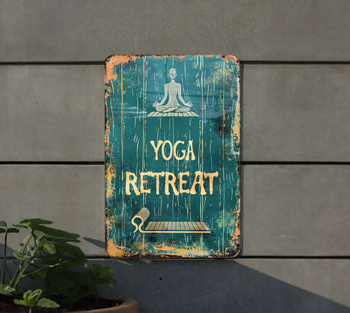 a sign on a wall that says yoga retreat
