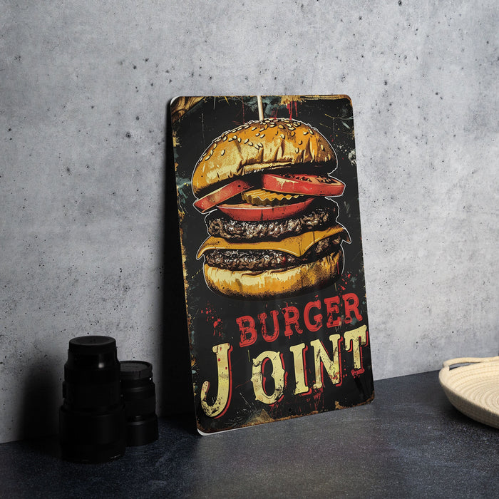 a burger joint sign sitting on top of a table