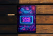 a game zone neon sign on a wooden wall