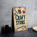 a sign that says craft store on it