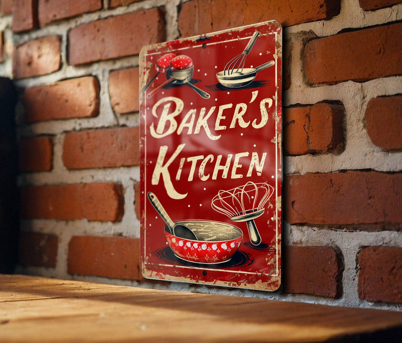 a red sign that says baker's kitchen on a brick wall